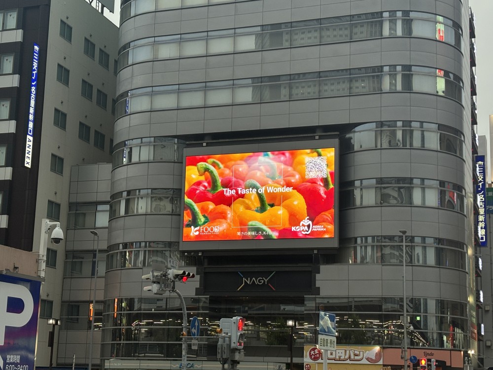 aT